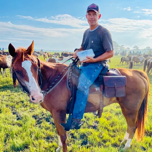 Steven Liscum with Legend’s ashes