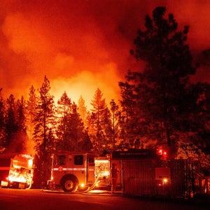 Firefighters monitor a backfire during the Mosquito fire in Foresthill, an unincorporated area of Placer County, California on September 13, 2022.