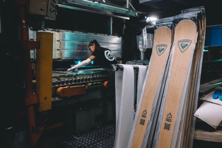 Worker making skis in a factory