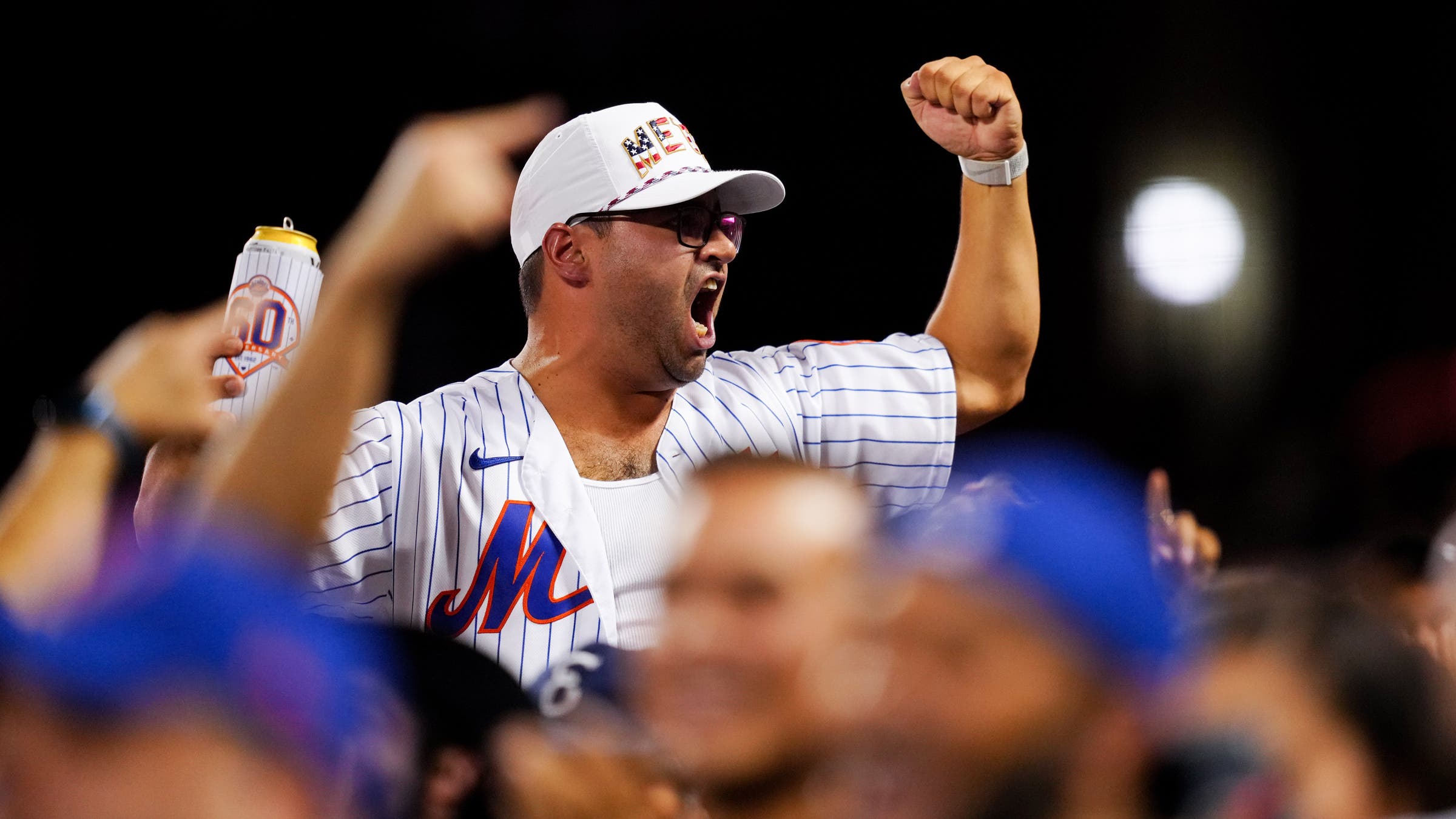 A baseball fan cheering