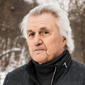John Irving in snowy woods