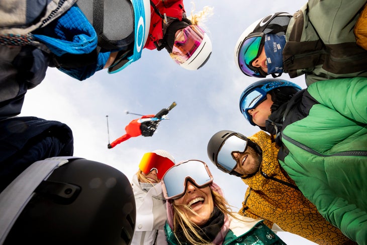 a group of skiers wearing Oakley sunglasses
