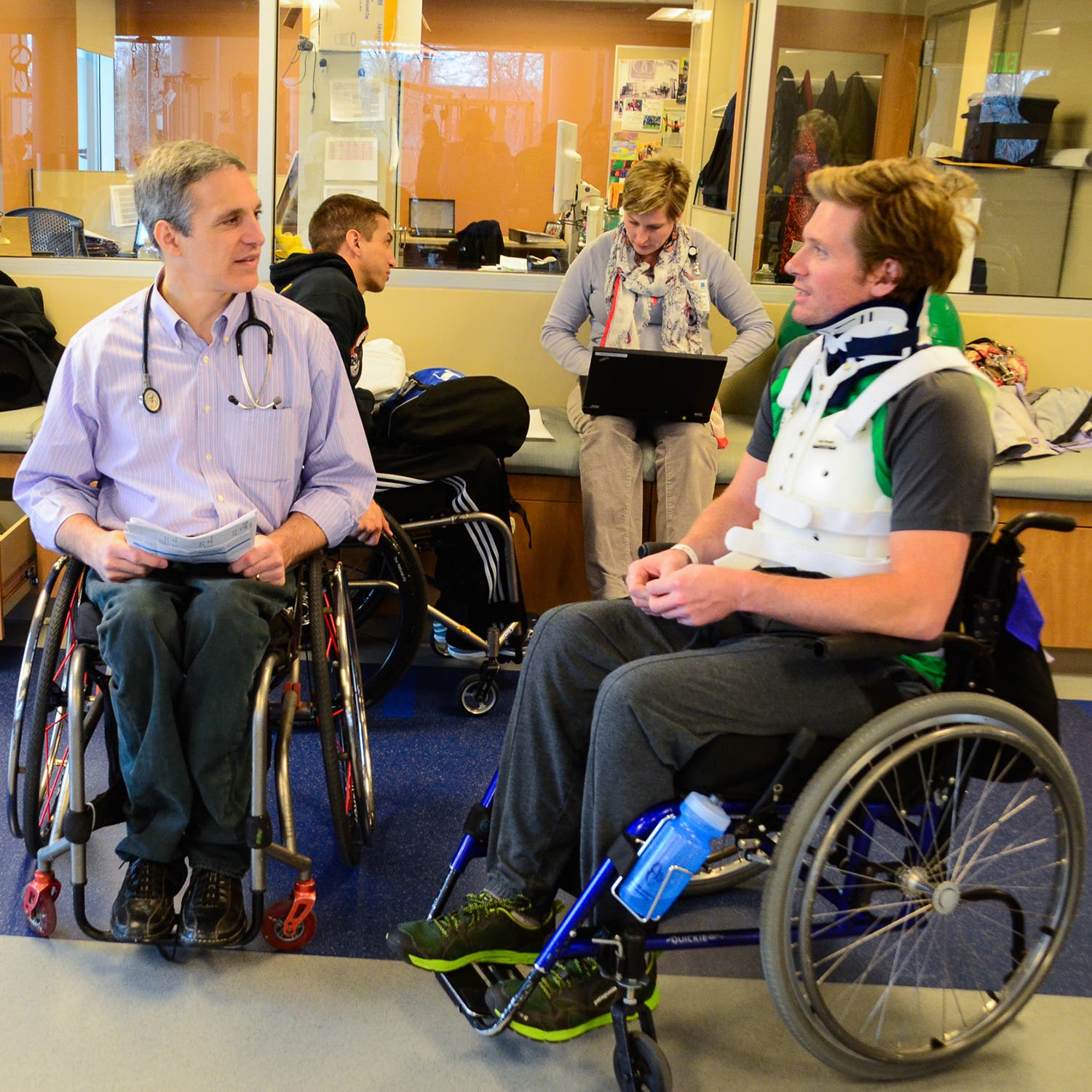 Harris speaking with a medical professional after his injury