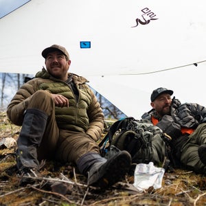 hunters under tarp lean-to