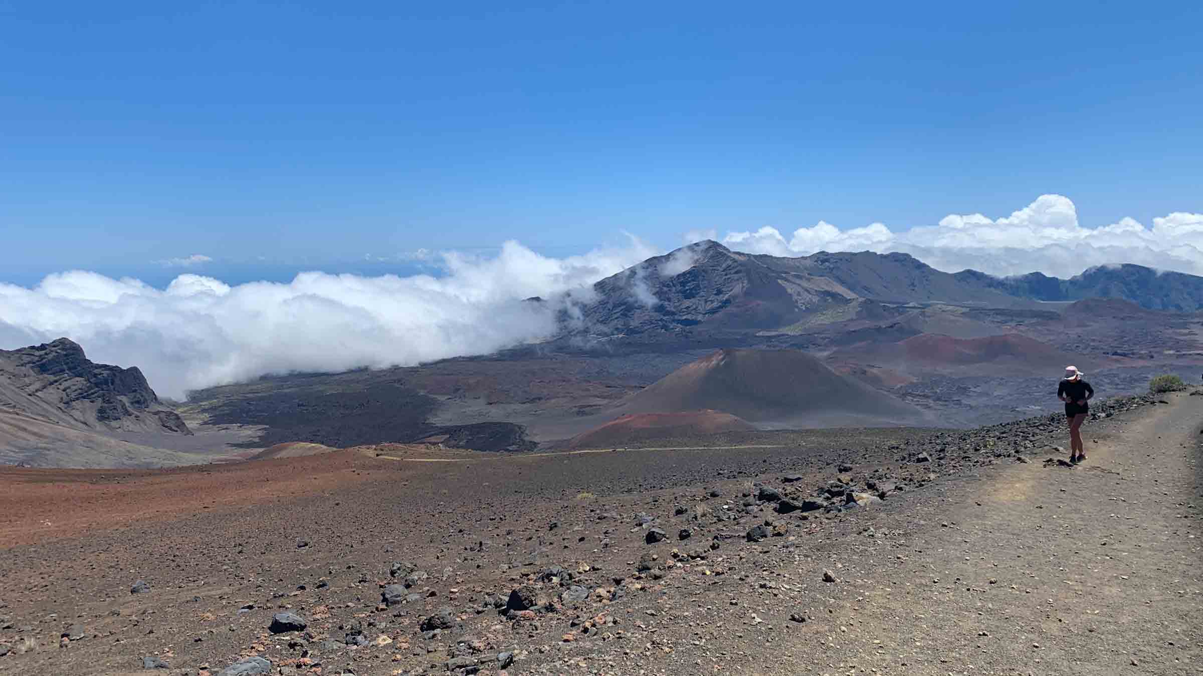 A woman runs the trail in Halekeala National Park.