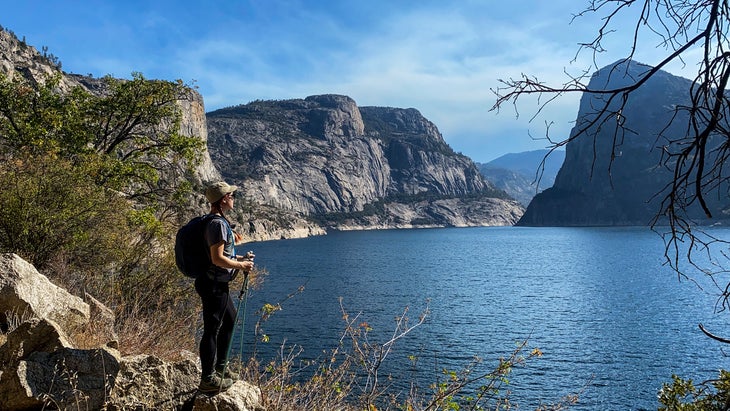 woman looking at lake