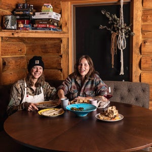 Iliana Regan (left) and her wife at their bed-and-breakfast, the Milkweed Inn, in 2019