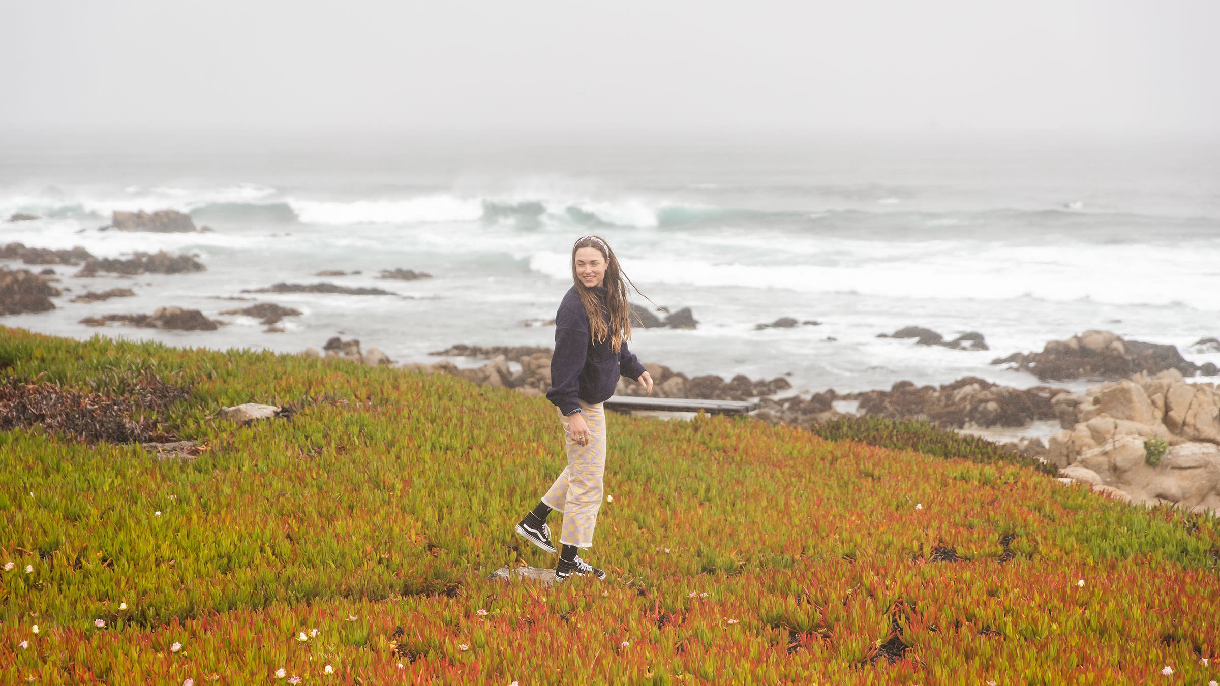 Wilson, a 25-year-old pro cyclist, in a field near the coast