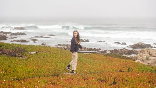 Wilson, a 25-year-old pro cyclist, in a field near the coast