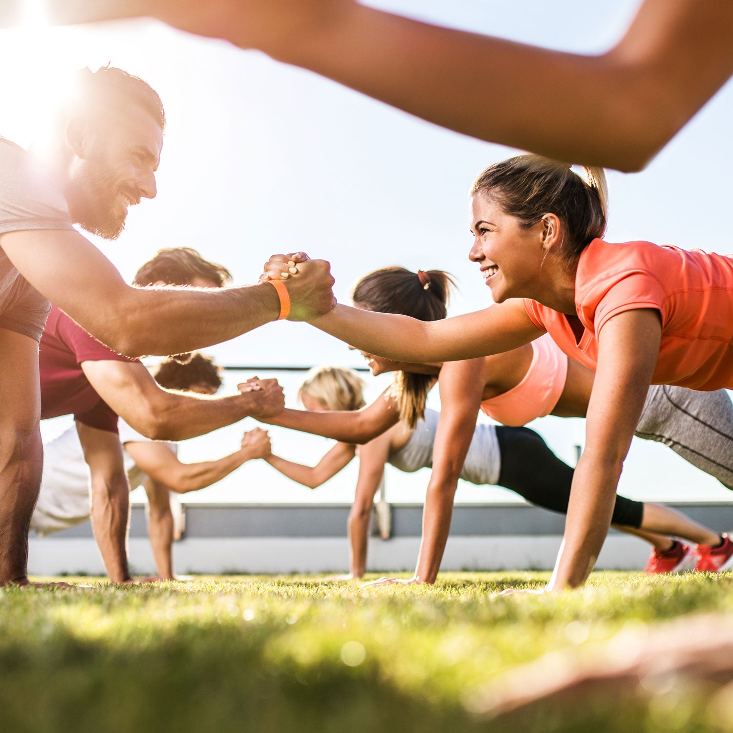 Active lifestyle and health. Happy young woman does workout, sits