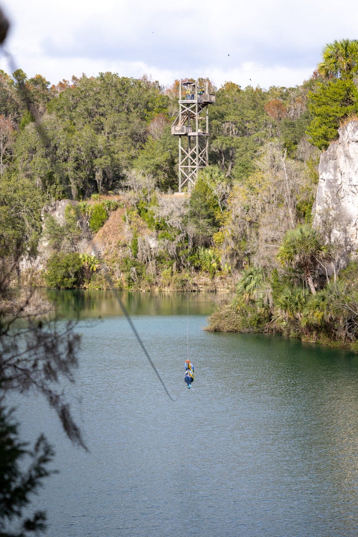 Zip-line over four spring-fed lakes.