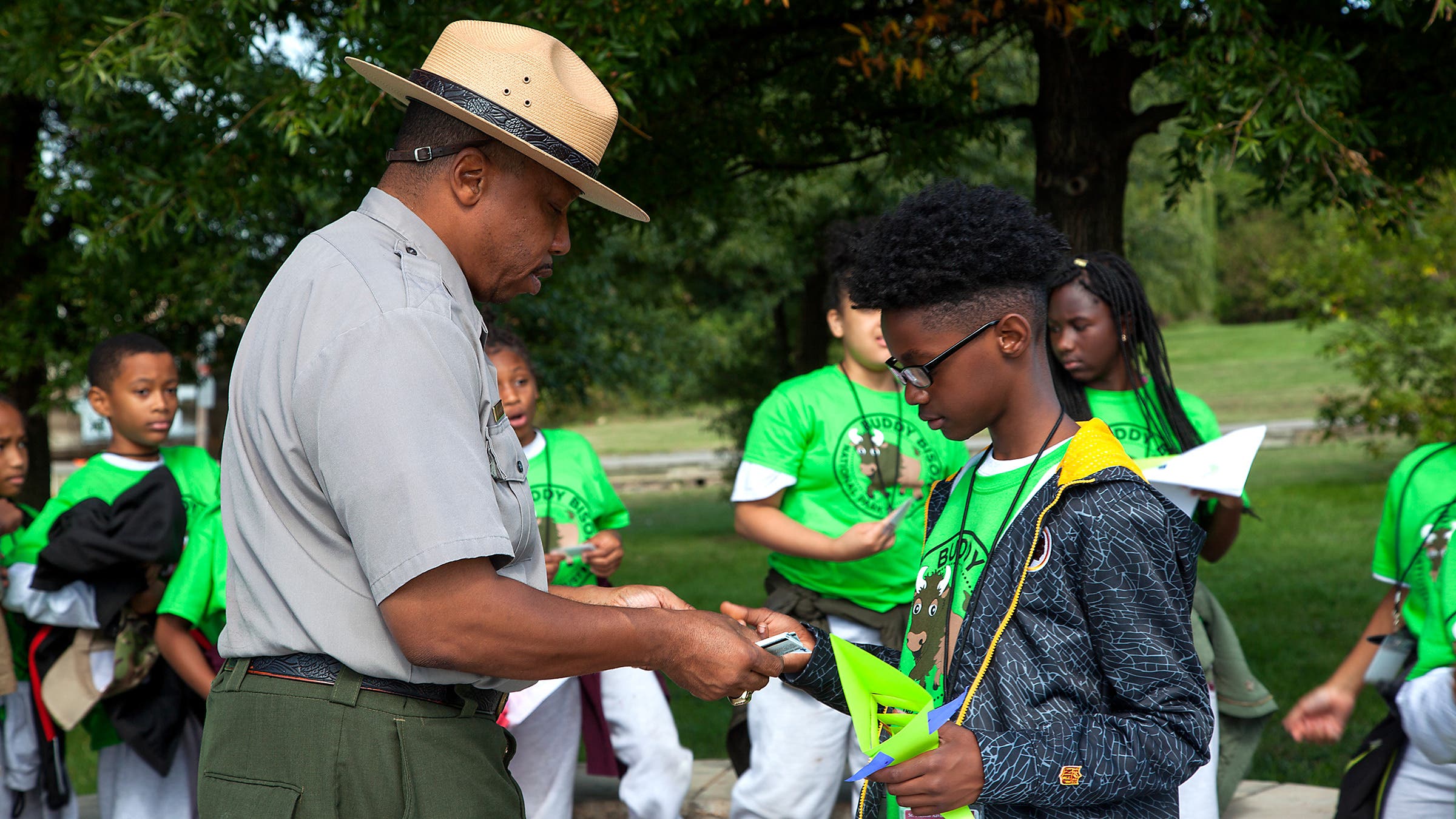 ranger gives award to child