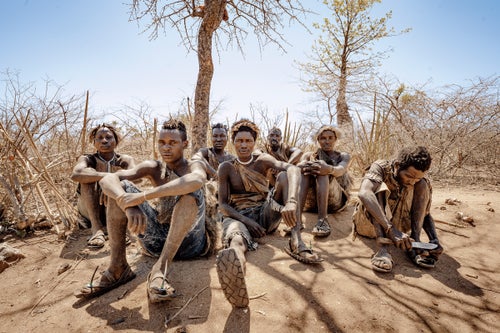 A group of Hadza men in the bush