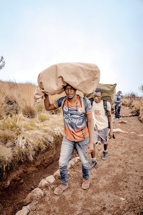 The crew from Lamagaya Safaris heading up Africa鈥檚 tallest peak