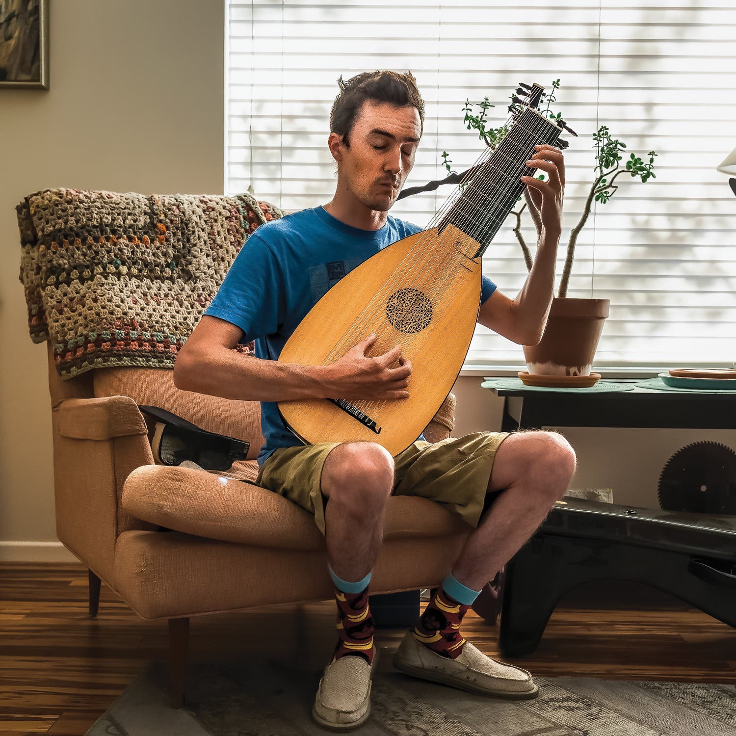 Earle practicing on his lute