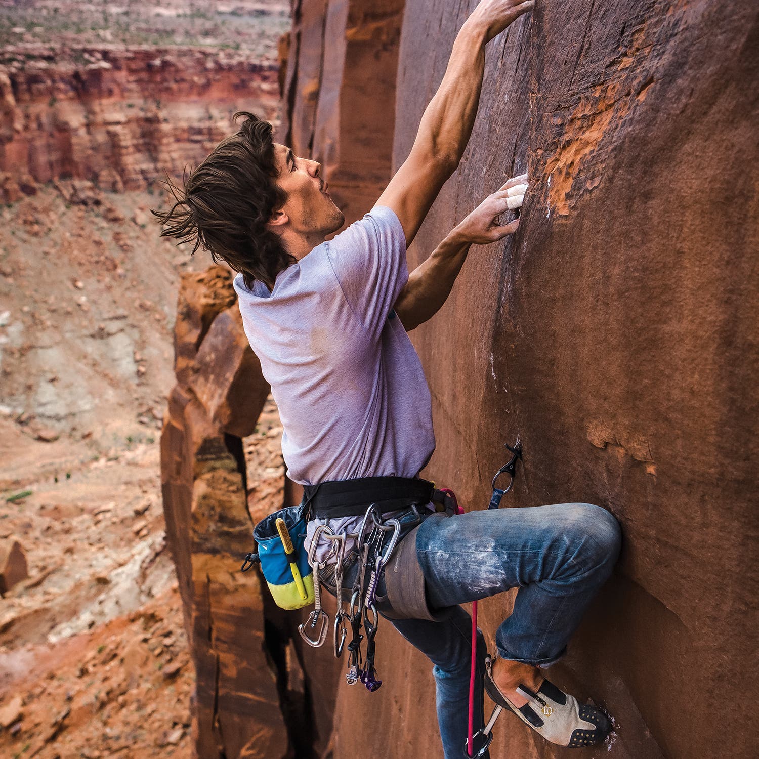 Earle doing a first ascent of Ringlock Ranch, near Moab, Utah. This was one of his last climbs before he fell ill.