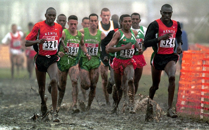 elite runners in mud at world cross country