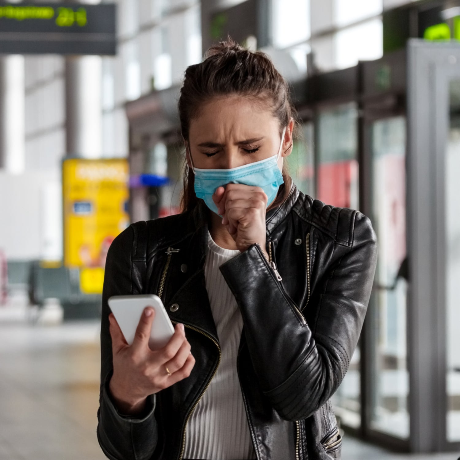 Premium Photo  Middle eastern manager lady using smartphone packing clothes  in shop