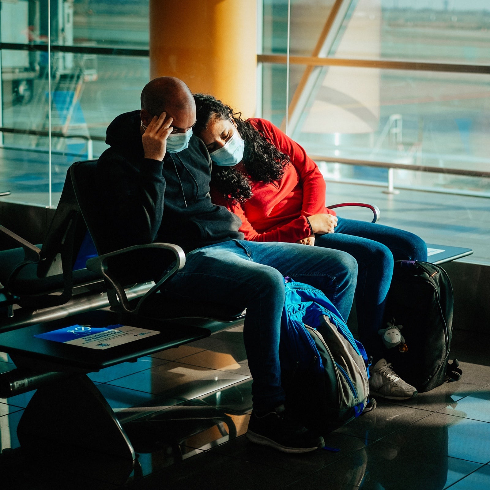 A tired couple at the airport in Buenos Aires, Argentina