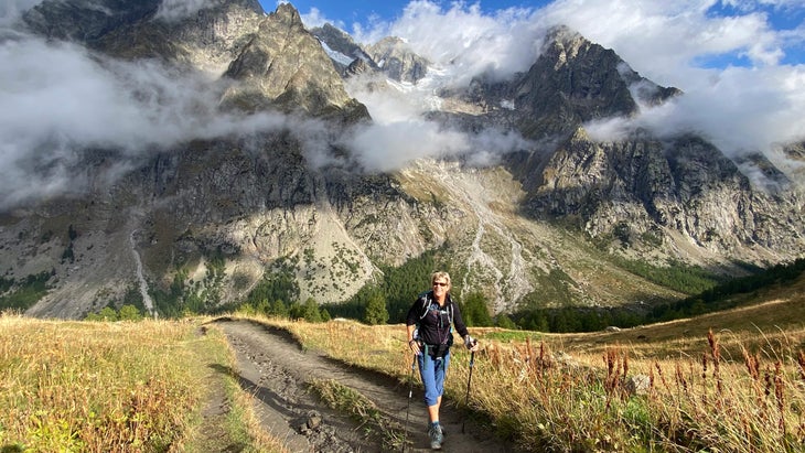 woman on trail in alps