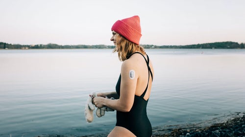 Woman gets ready for a cold plunge