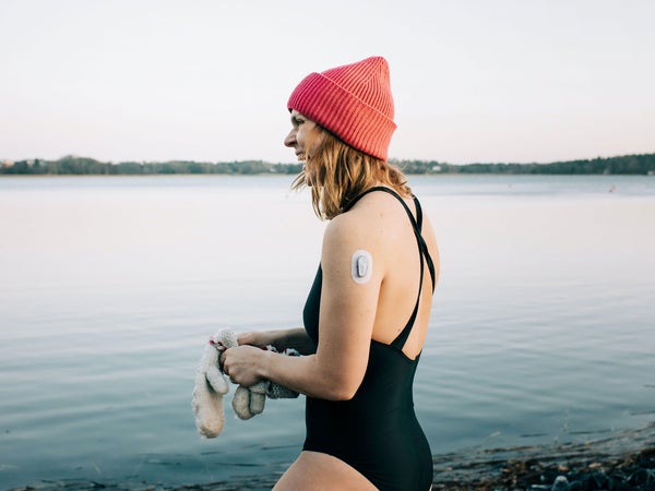 Woman gets ready for a cold plunge
