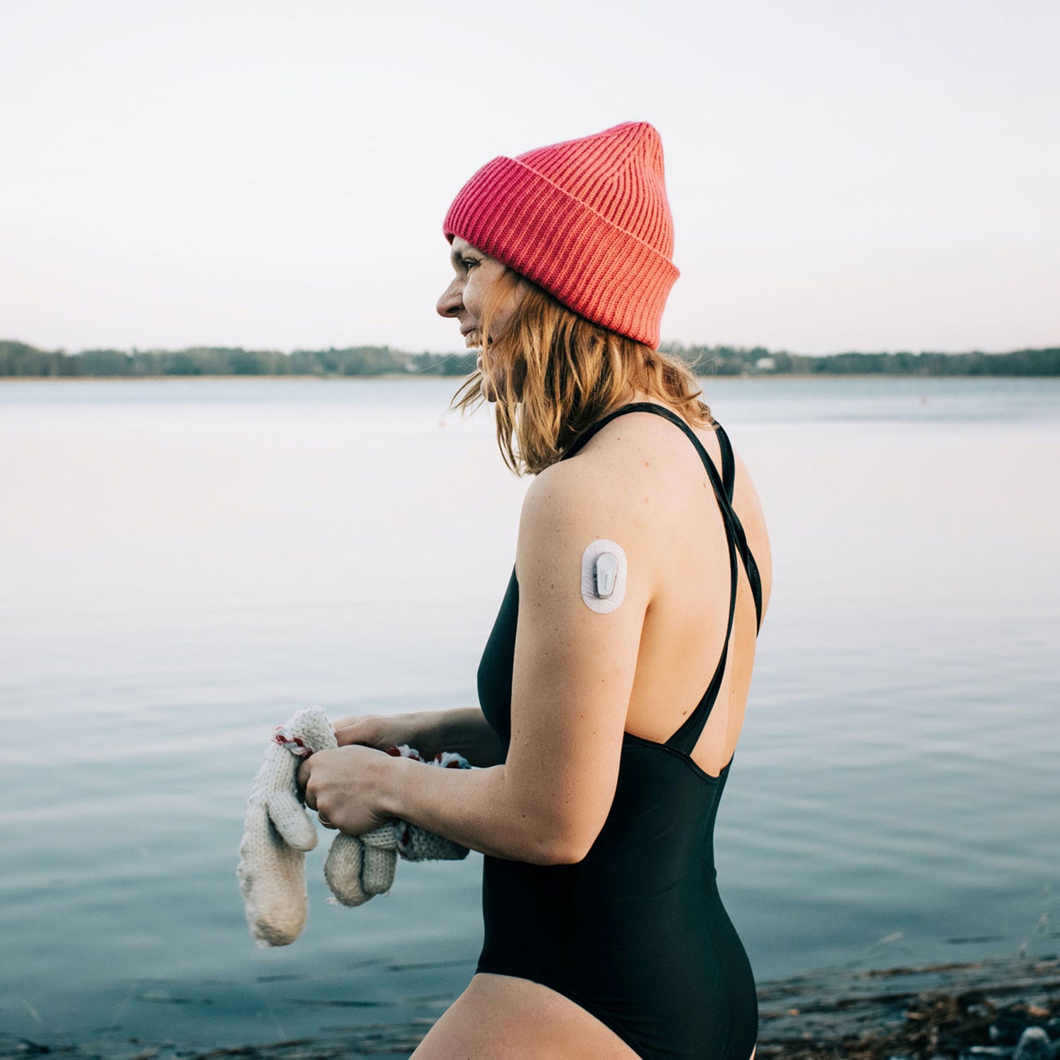 Woman gets ready for a cold plunge