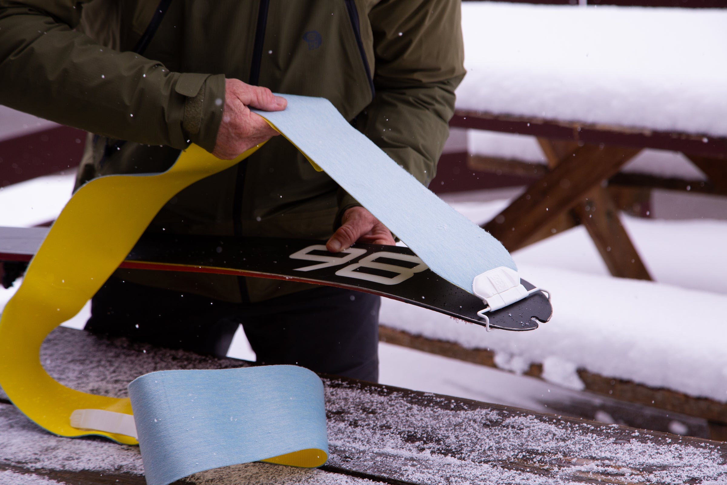 Attaching climbing skins to skis