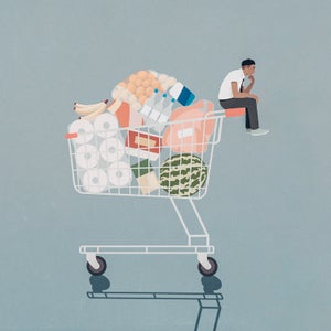 An illustration of a small person sitting atop a full grocery cart