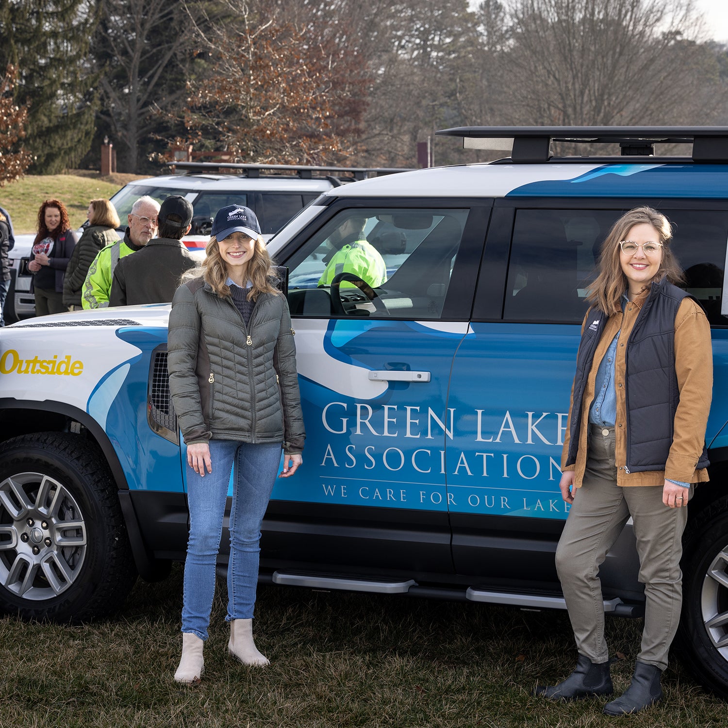 Green Lake Association’s CEO, Stephanie Prellwitz, and Watershed Engagement Manager, Taylor Haag, with ϳԹ’s Senior Sales Director, Chad Johnson, at Land Rover’s Defender Service Awards Winners Weekend at Biltmore Estates