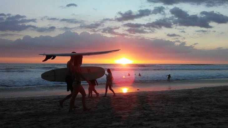 A group of surfers in Santa Teresa, Costa Rica