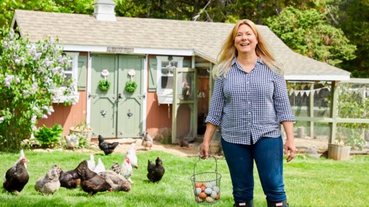 Lisa Steele in front of coop