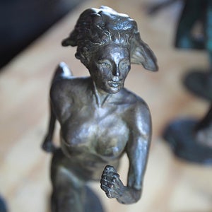 A closeup of Bobbi Gibb's sculpture