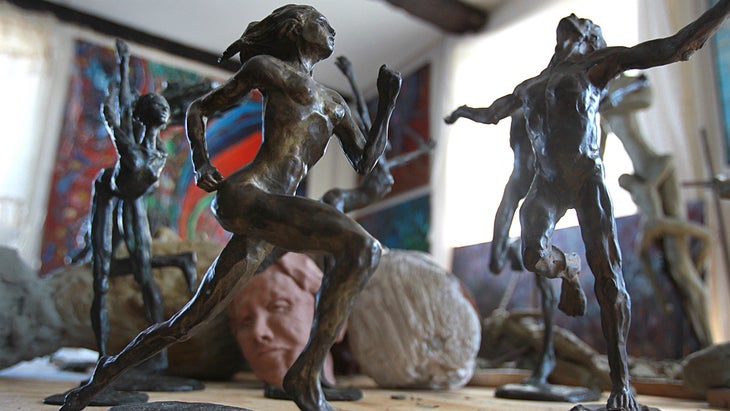 A closeup image of Bobbi Gibb's sculptures of women running