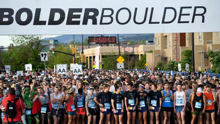 A large group of runners line up for the Bolder Boulder 10K