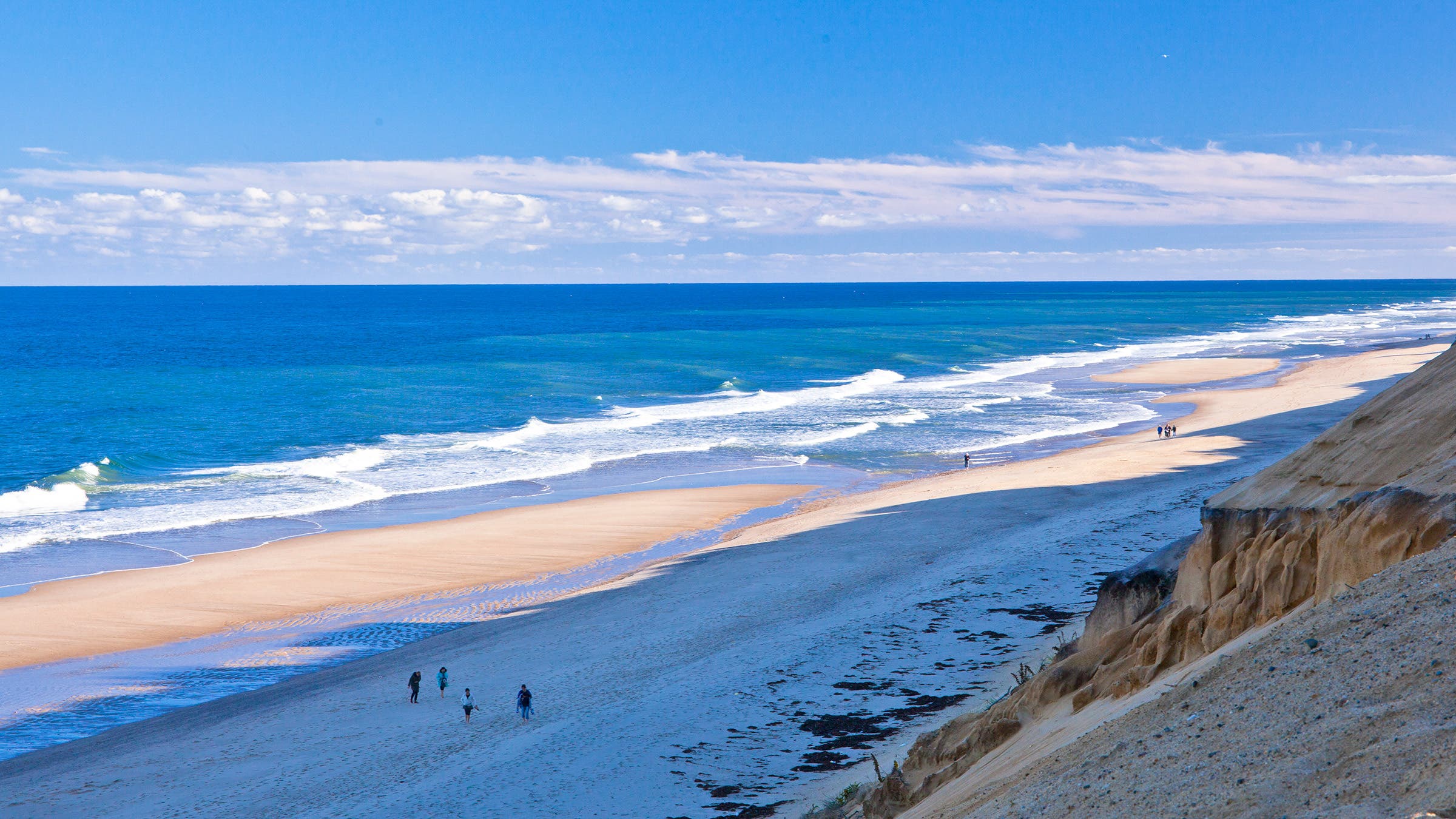 seashore people walking