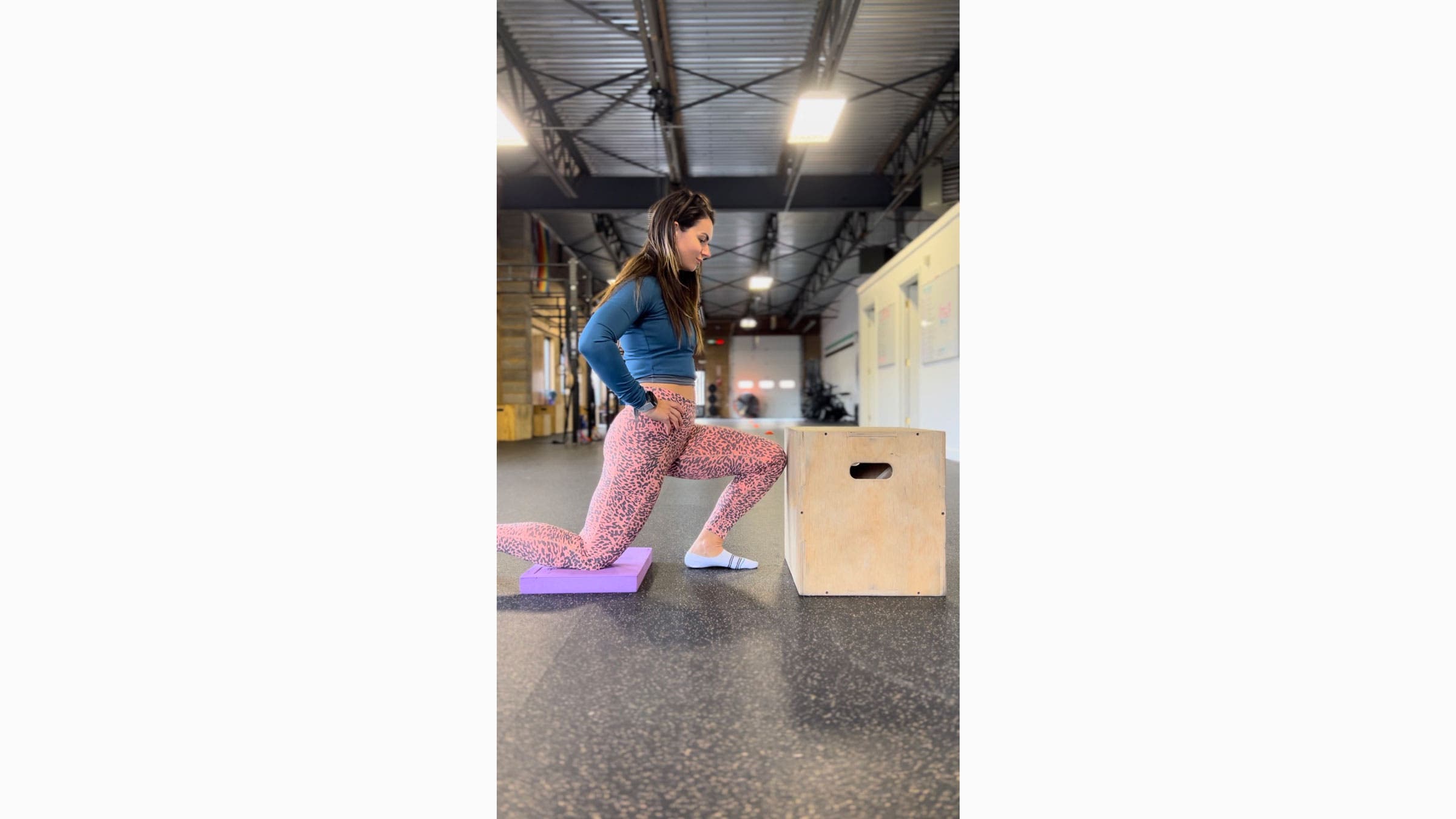 Woman practices the Knee-to-Wall Test for ankle mobility