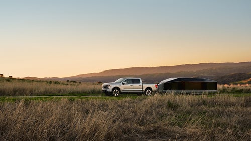 LIghtship RV being towed behind a truck