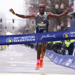 Evans Chebet of Kenya crosses the finish line in first place at the Boston Marathon