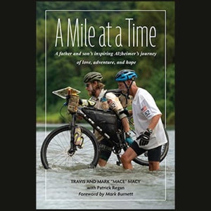 Cover or A Mile at a Time, where son and father are crossing a river with a bike