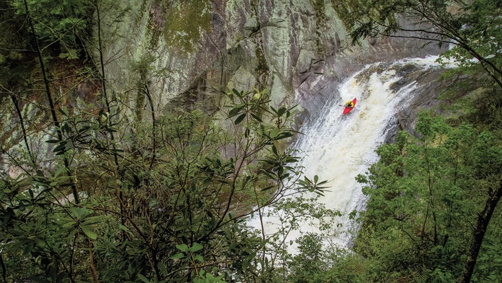 A kayaker shoots the falls in Pisgah National Forest, near Boone.