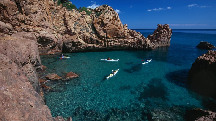 paddling off island coast