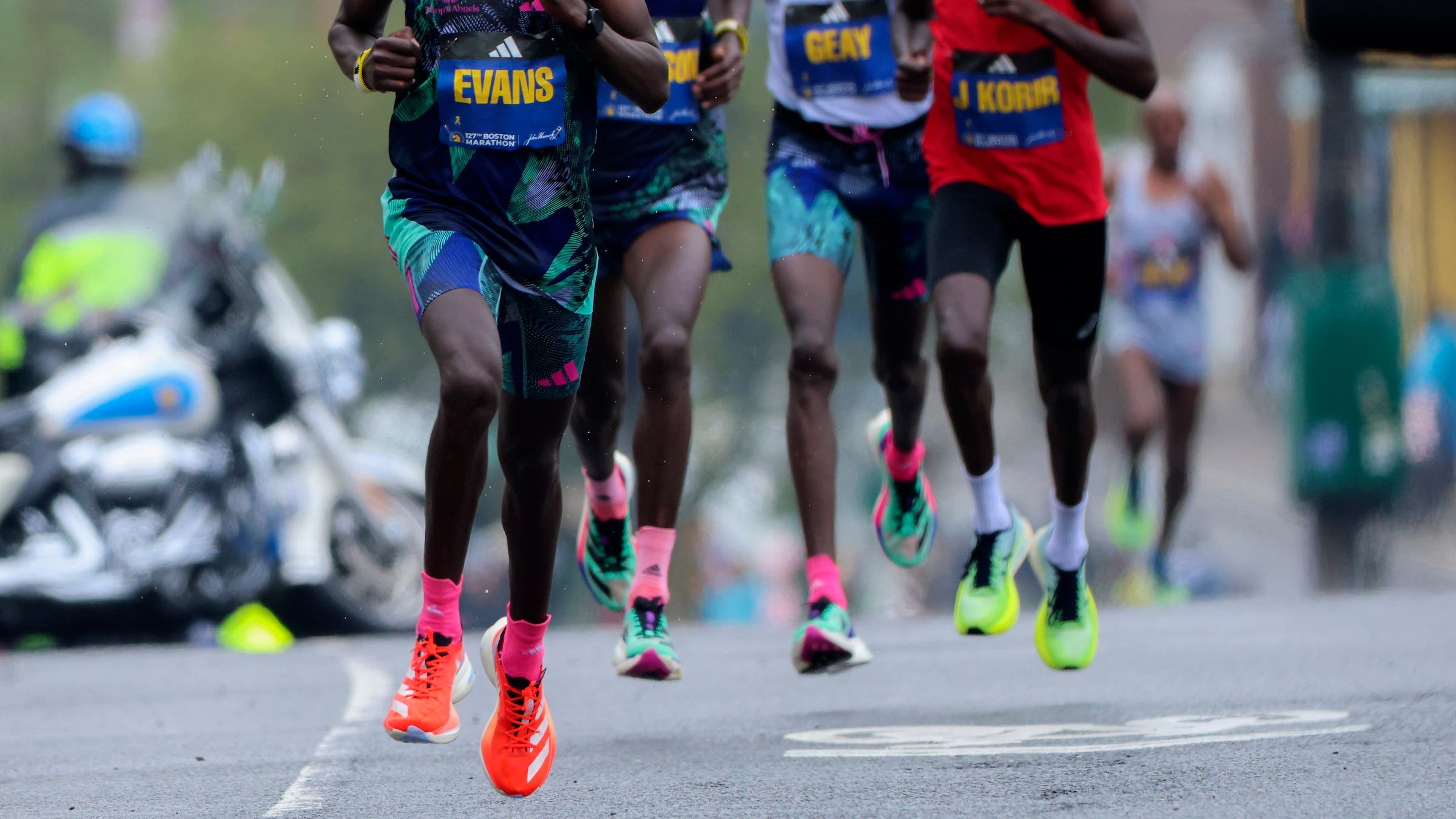front runners to the boston marathon are wearing adidas shoes
