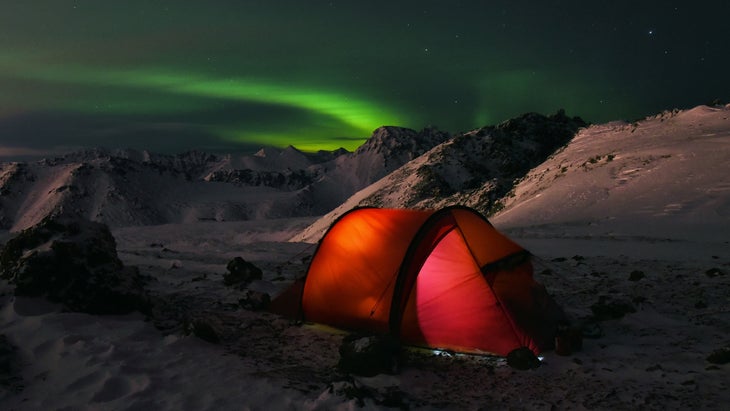 camping mountains northern lights