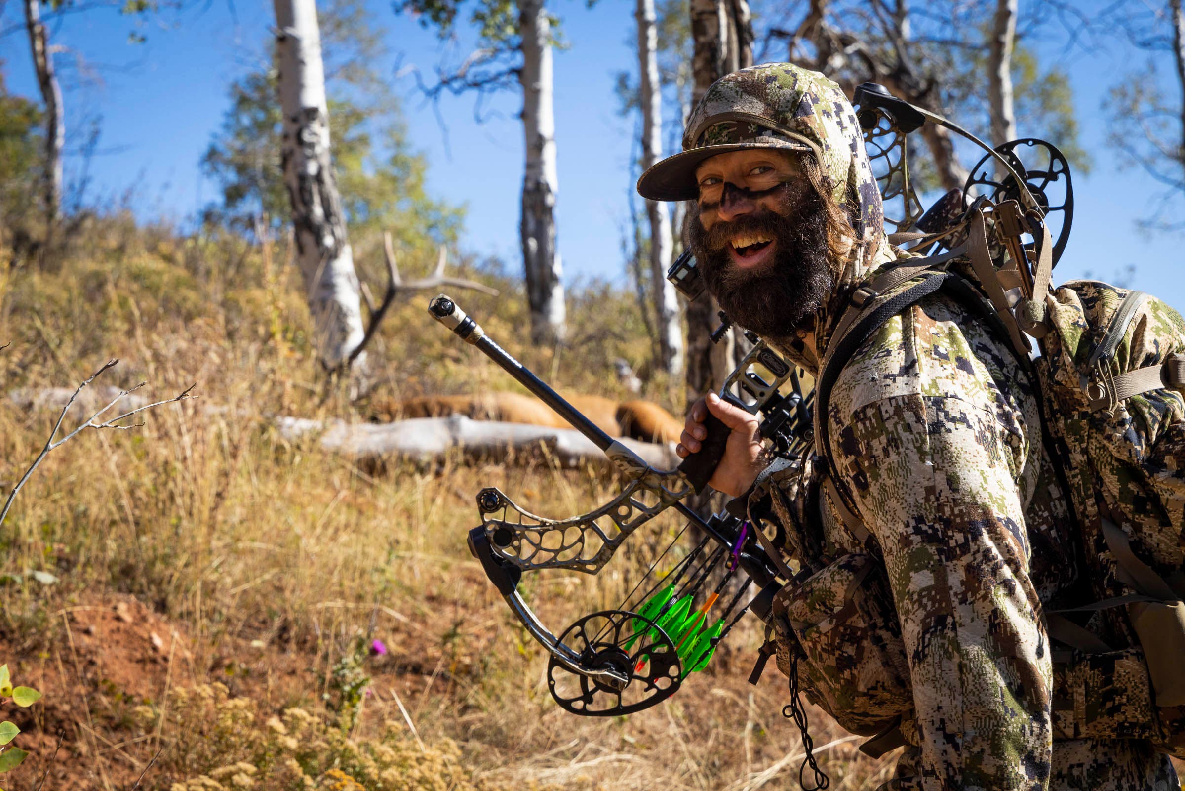 Snowboarder Eric Jackson bowhunting elk