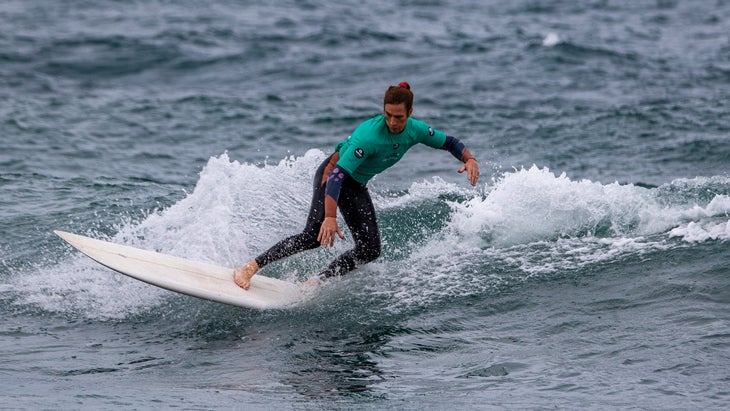 Sasha Jane Lowerson rides a wave.