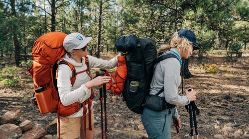 hikers wearing backpacking packs