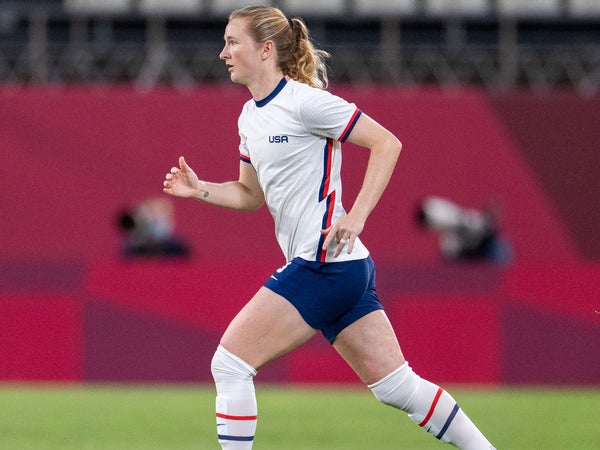 Sam Mewis plays soccer