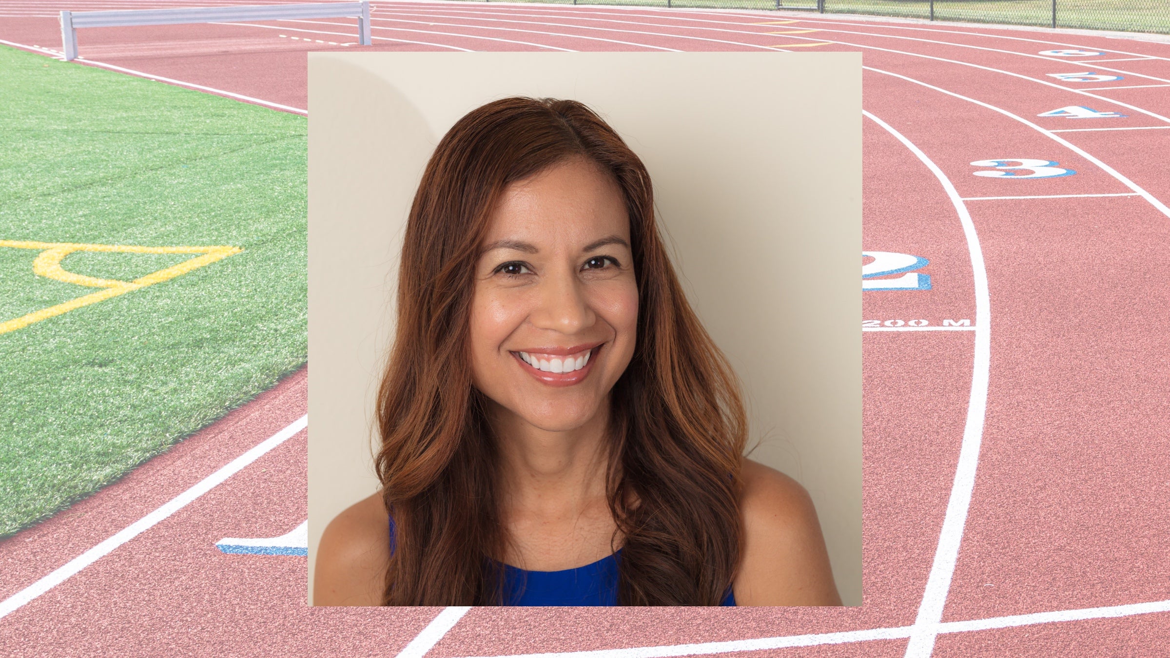 sharon hernandez portrait in front of a track