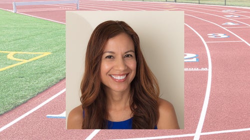 sharon hernandez portrait in front of a track